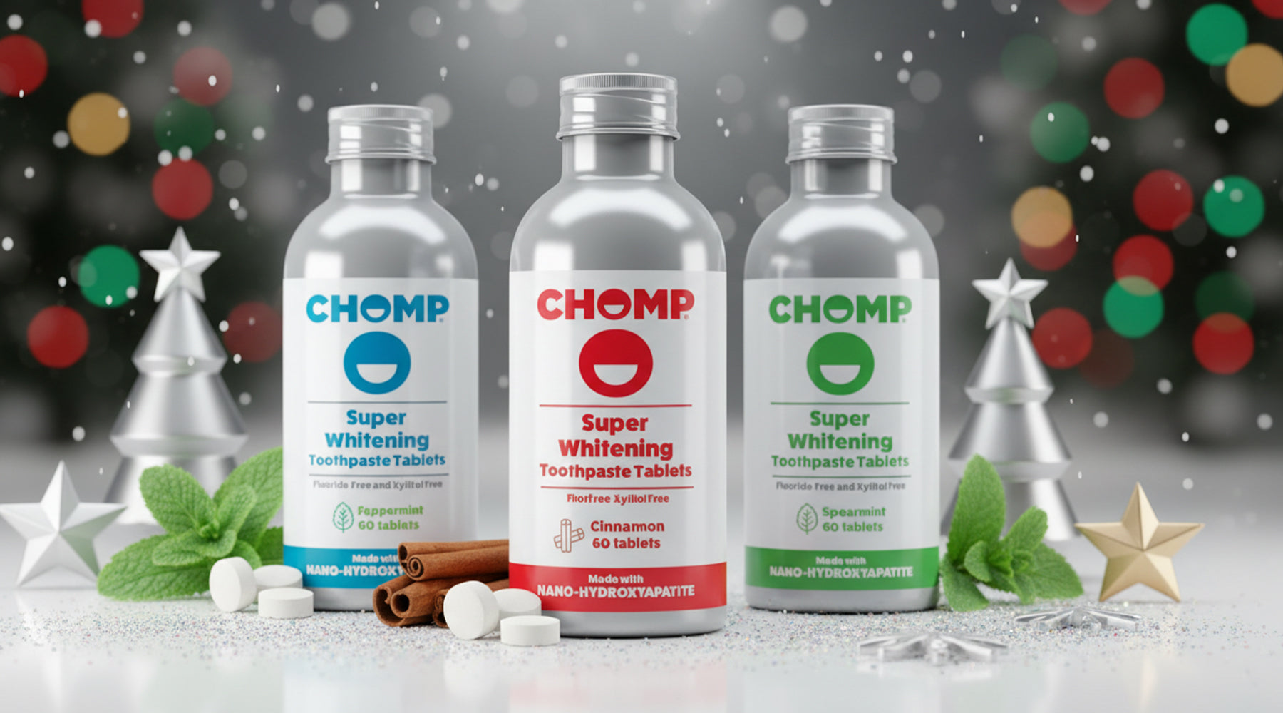 Three bottles of Chomp Super Whitening Toothpaste Tablets with Christmas decorations in the background.