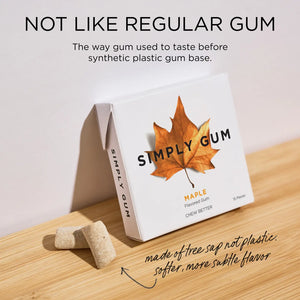 Box of Simply Gum with a maple leaf design on a wooden surface