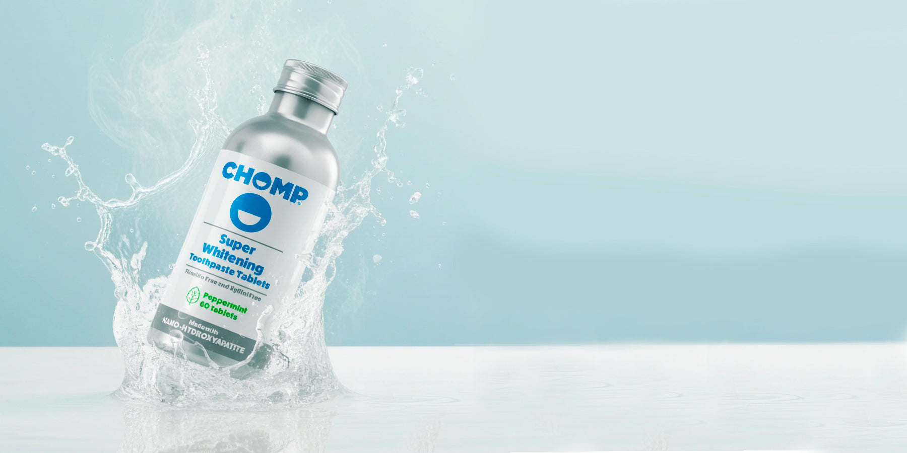 Chomp super water tablet bottle with water splashes on a light blue background
