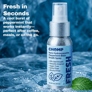 Chomp breath spray bottle with peppermint leaves on a blue background