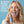 Woman using a mouth spray with text about its benefits on a blue background