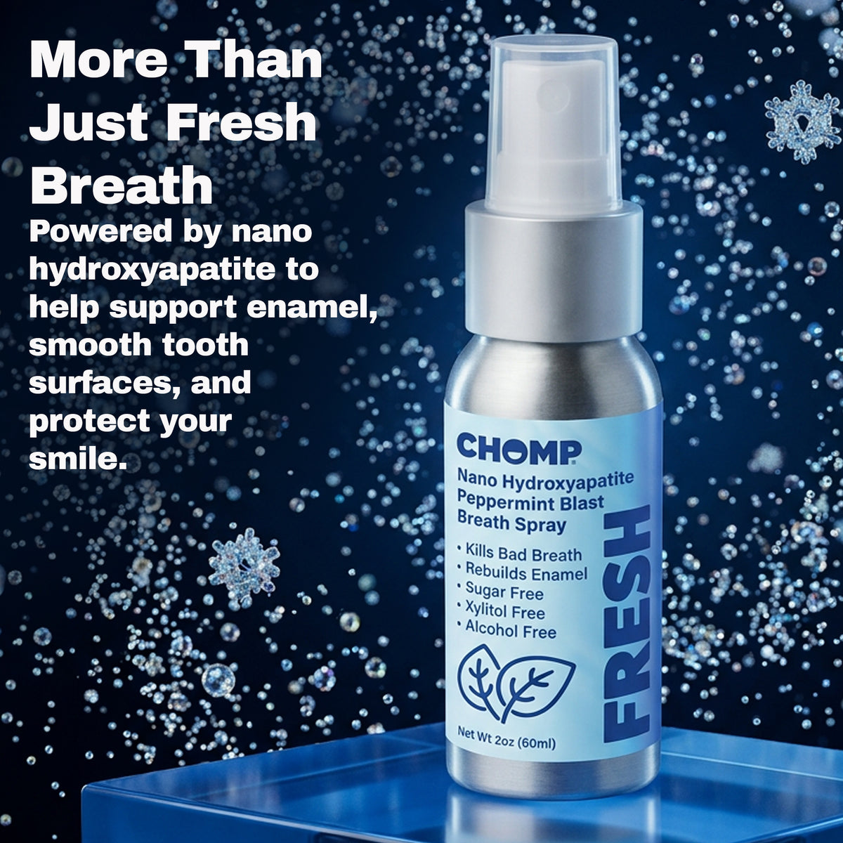 CHOMP breath spray bottle with text about fresh breath and enamel support on a blue background with snowflakes.