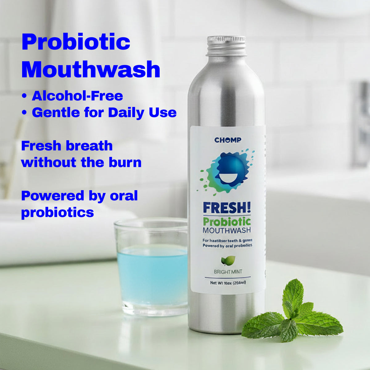 Probiotic mouthwash bottle with a glass of mouthwash and mint leaves on a bathroom counter.