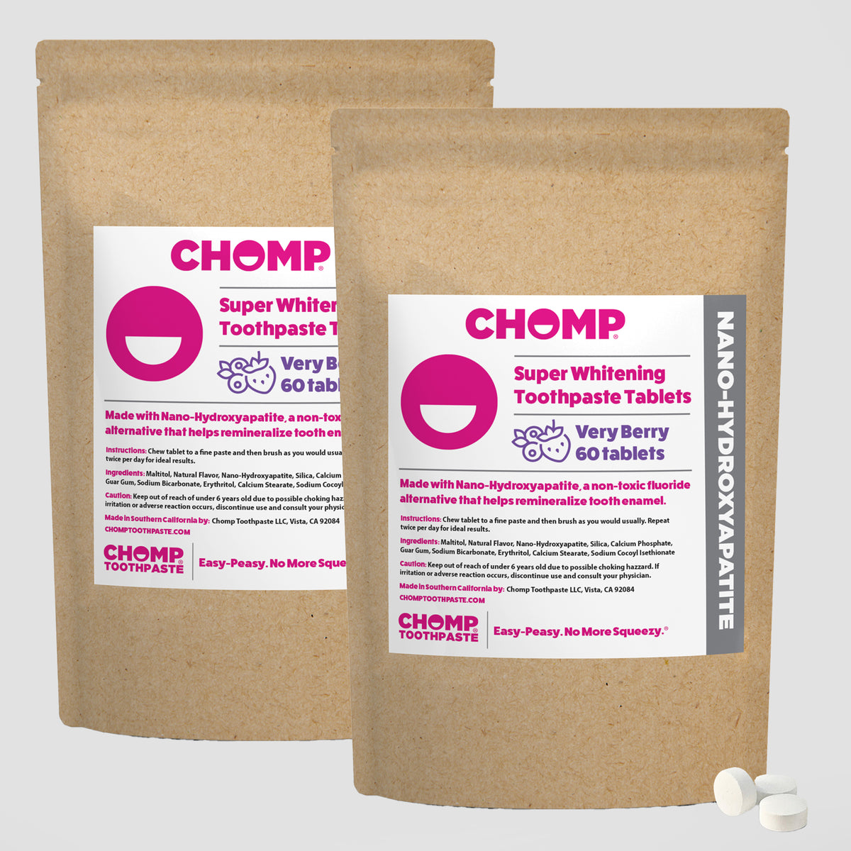 Two packages of CHOMP Super Whitening Toothpaste Tablets on a white background