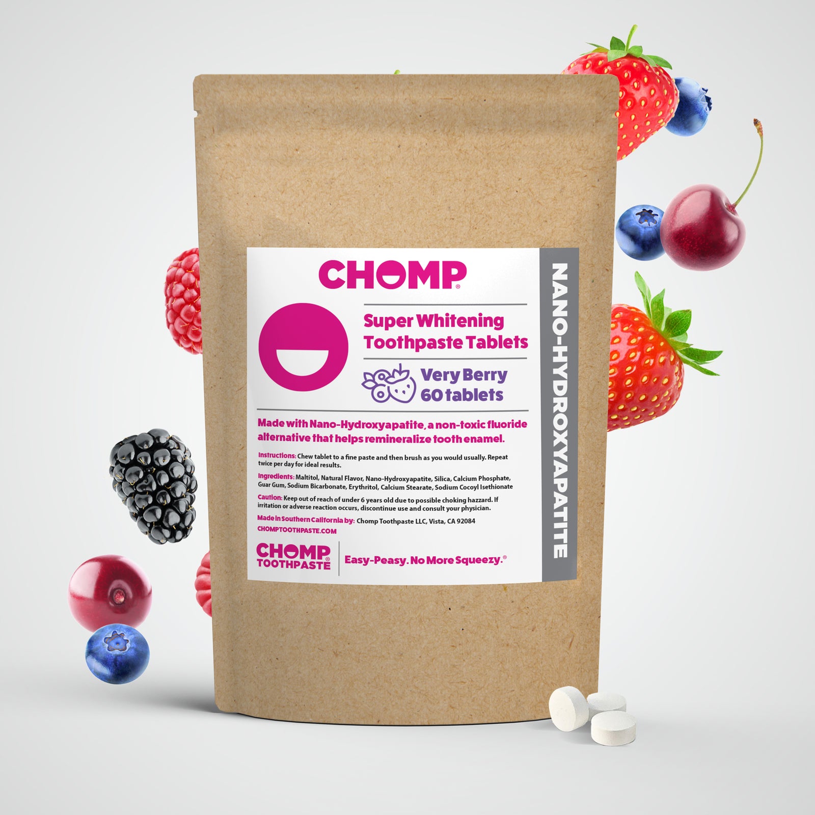 Chomp super whitening toothpaste tablets packaging with berries on a white background