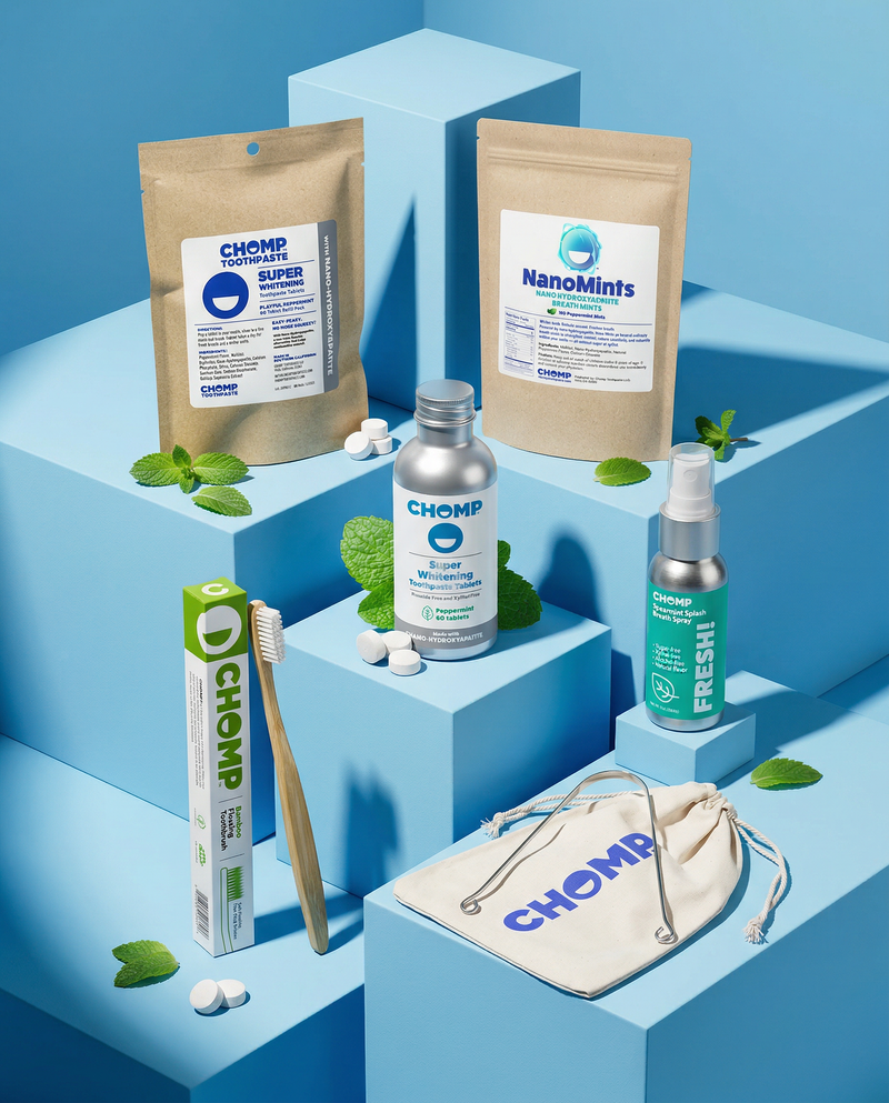 Collection of CHOMP products including bags, toothbrush, and bottles on a blue geometric background