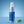 Chomp peppermint chill breath spray bottle with a blue background