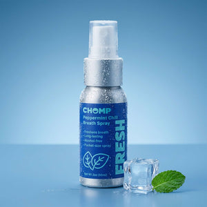Chomp peppermint chill breath spray bottle with a blue background