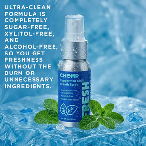 Chomp peppermint chill breath spray bottle with mint leaves on a blue background
