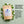 A kraft paper stand-up pouch of Fresh! Gum peppermint sugar-free gummies, shown on a white background with two white gummies and mint leaves.