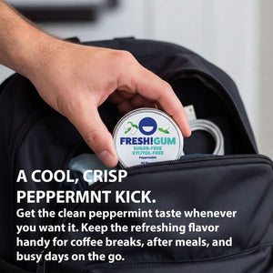 FRESH! gum tin being put into a black backpack by a male.