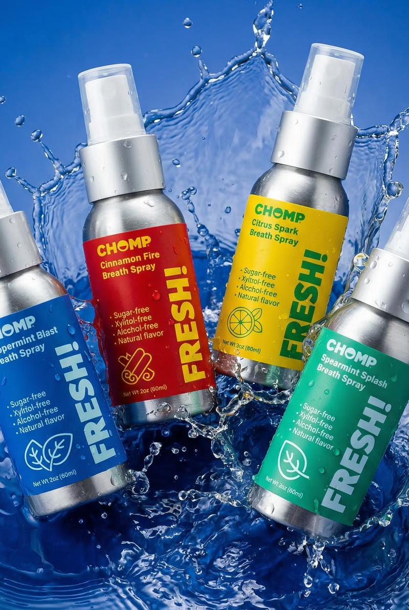 Five spray bottles with colorful labels on a blue water background