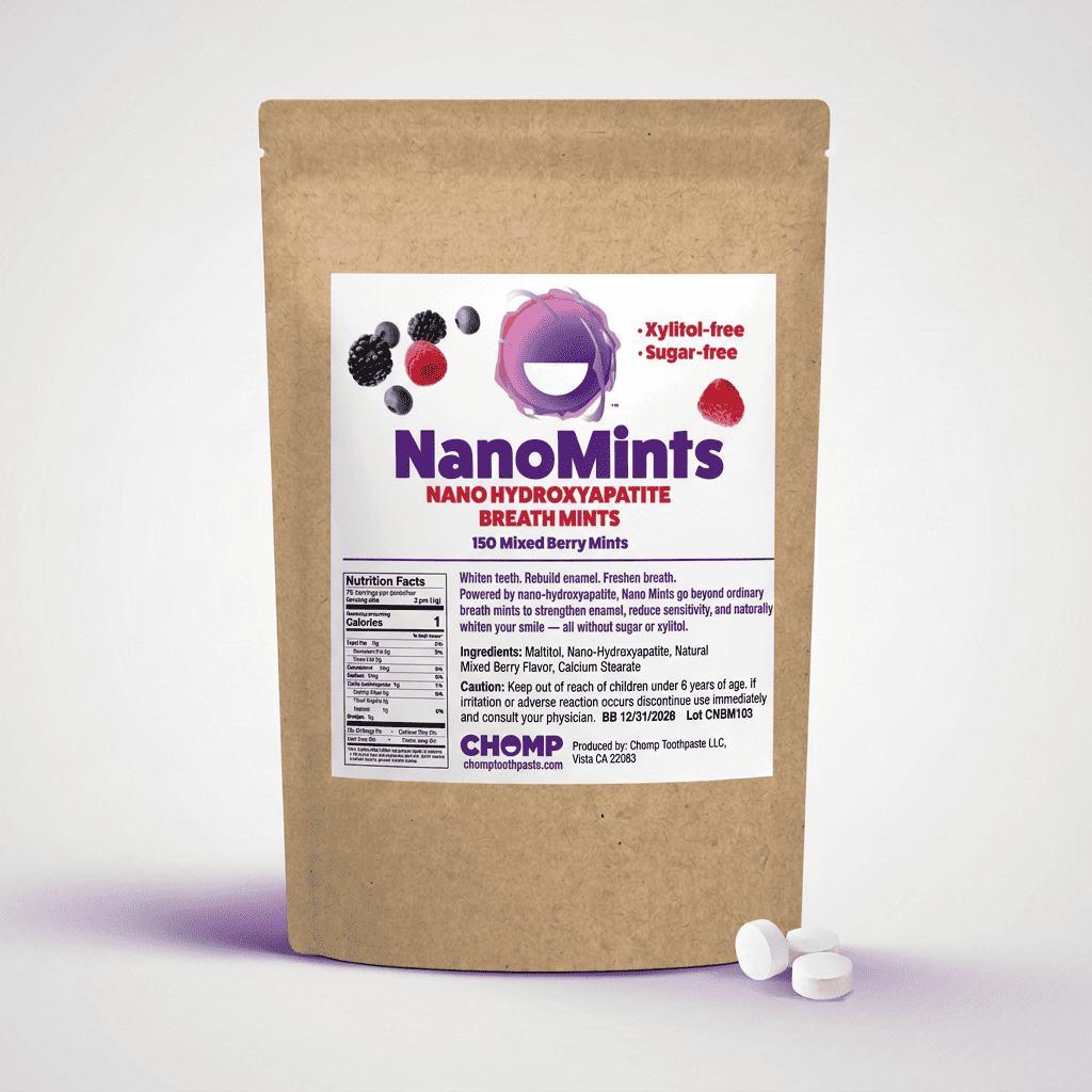 A stand-up kraft paper pouch labeled NanoMints Breath Mints, shown on a light gray background with two white round mints in front.
