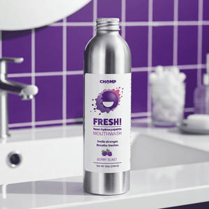 Chomp mouthwash bottle on a bathroom counter with purple tiles in the background