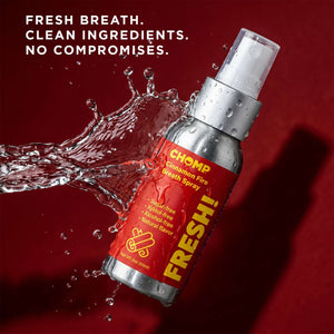 Chomp cinnamon fire breath spray with water splash on a red background