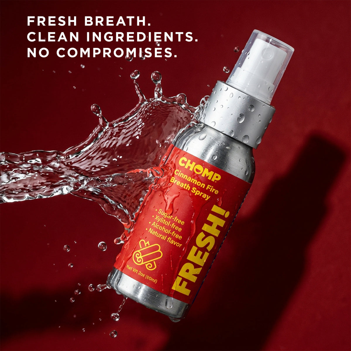 Chomp cinnamon fire breath spray with water splash on a red background