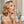 Woman using a breath freshener spray with text about its effects.