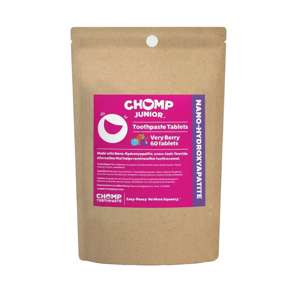 Chomp Junior toothpaste tablets packaging with berries on a white background