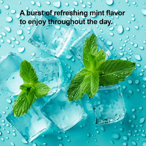 Ice cubes with mint leaves on a blue background with water droplets.