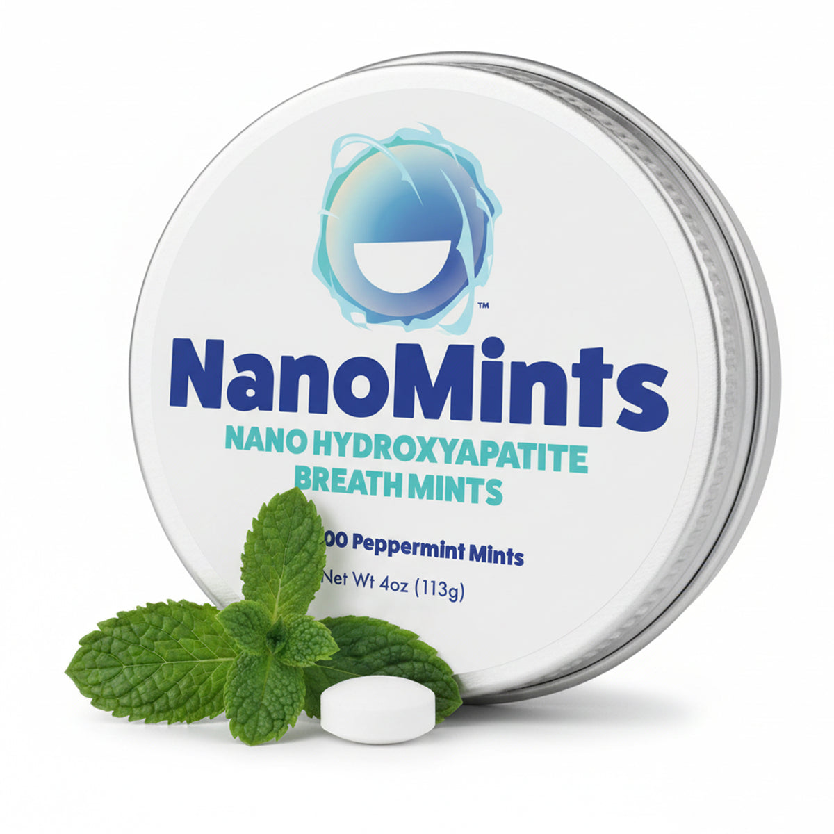 Tin of NanoMints with mint leaves and a mint tablet on a white background