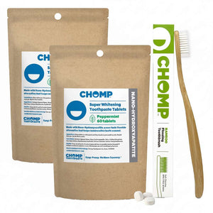 CHOMP toothpaste tablets packaging with a toothbrush on a white background