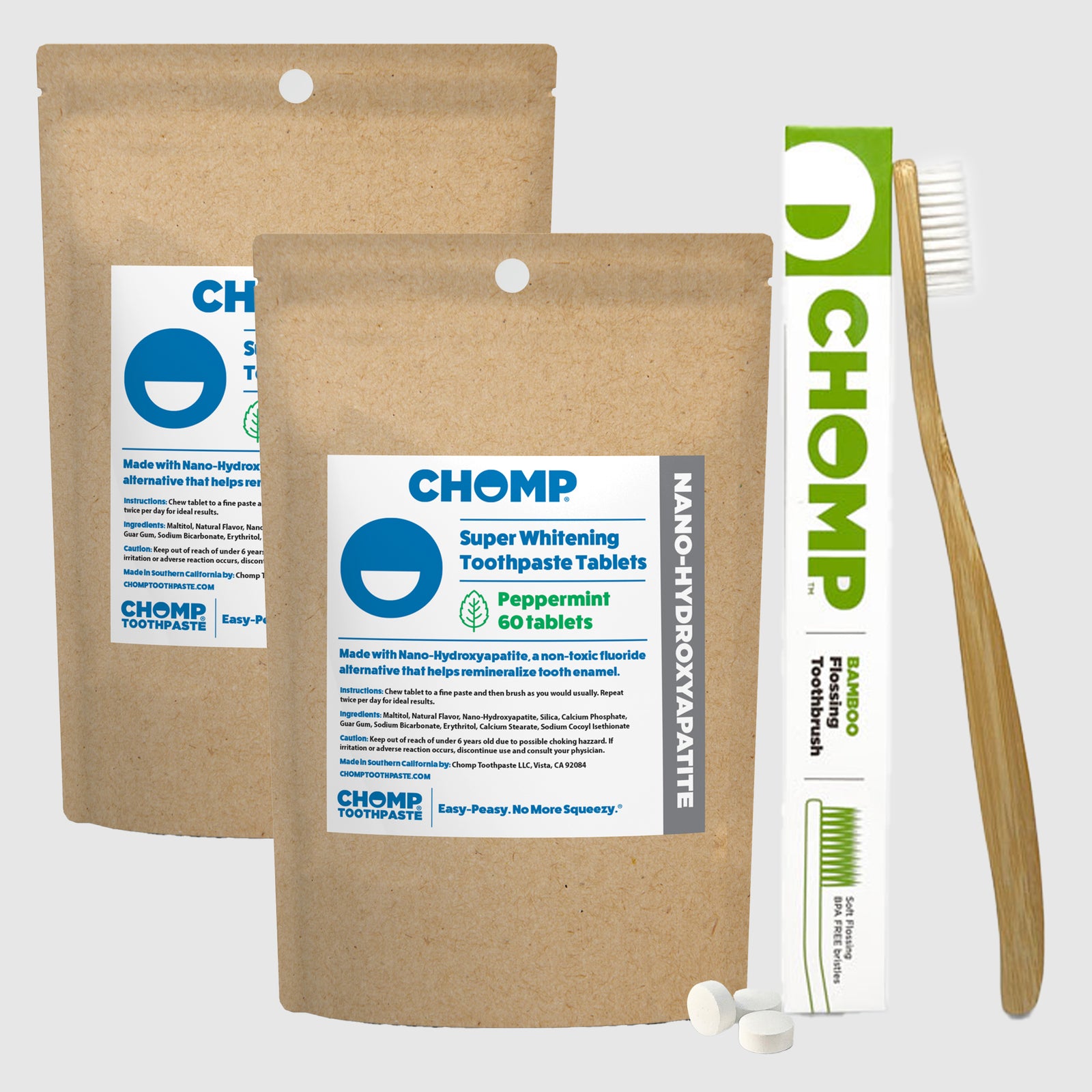 CHOMP toothpaste tablets packaging with a toothbrush on a white background