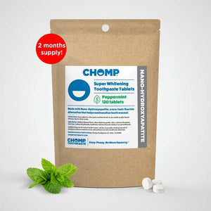 CHOMP Super Whitening Toothpaste Tablets packaging with a mint leaf on a white background