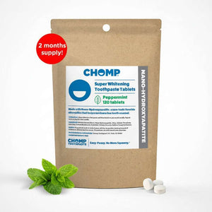 CHOMP Super Whitening Toothpaste Tablets packaging with a mint leaf on a white background