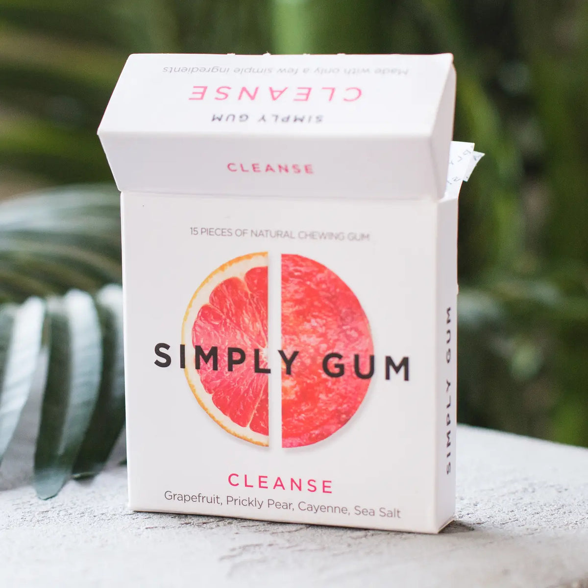 Simply Gum package with grapefruit design on a natural background