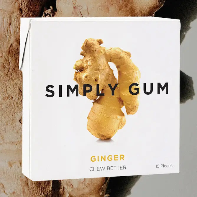 Box of Simply Gum Ginger flavor with a ginger root on a white background