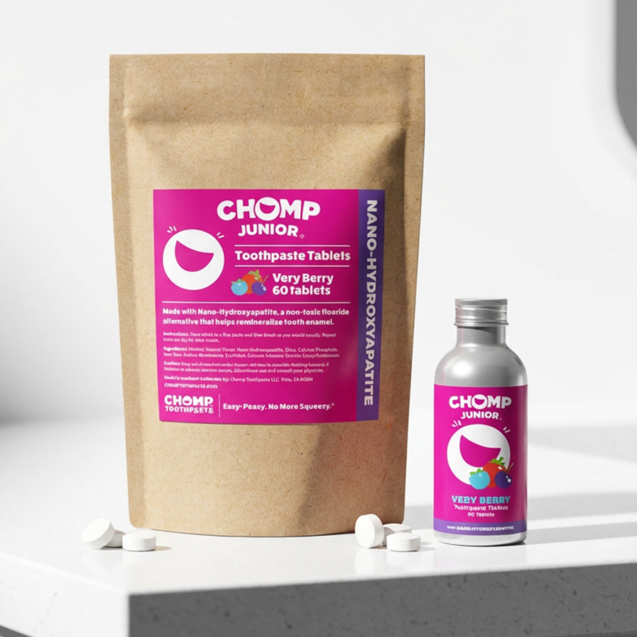 Chomp Junior toothpaste tablets packaging with a bottle on a white background