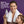 Woman holding a bottle of mouthwash with a child, against a purple background