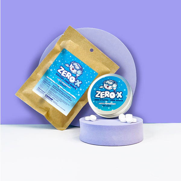 ZERO-X Arctic Peppermint product packaging on a purple background