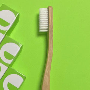 chomp bamboo flossing toothbrush